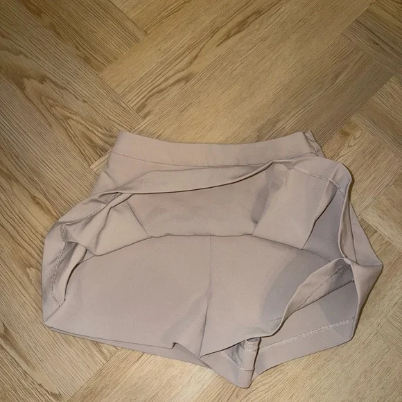 Dynamite Pleated Skort in Light Beige - Picture 2 of 4